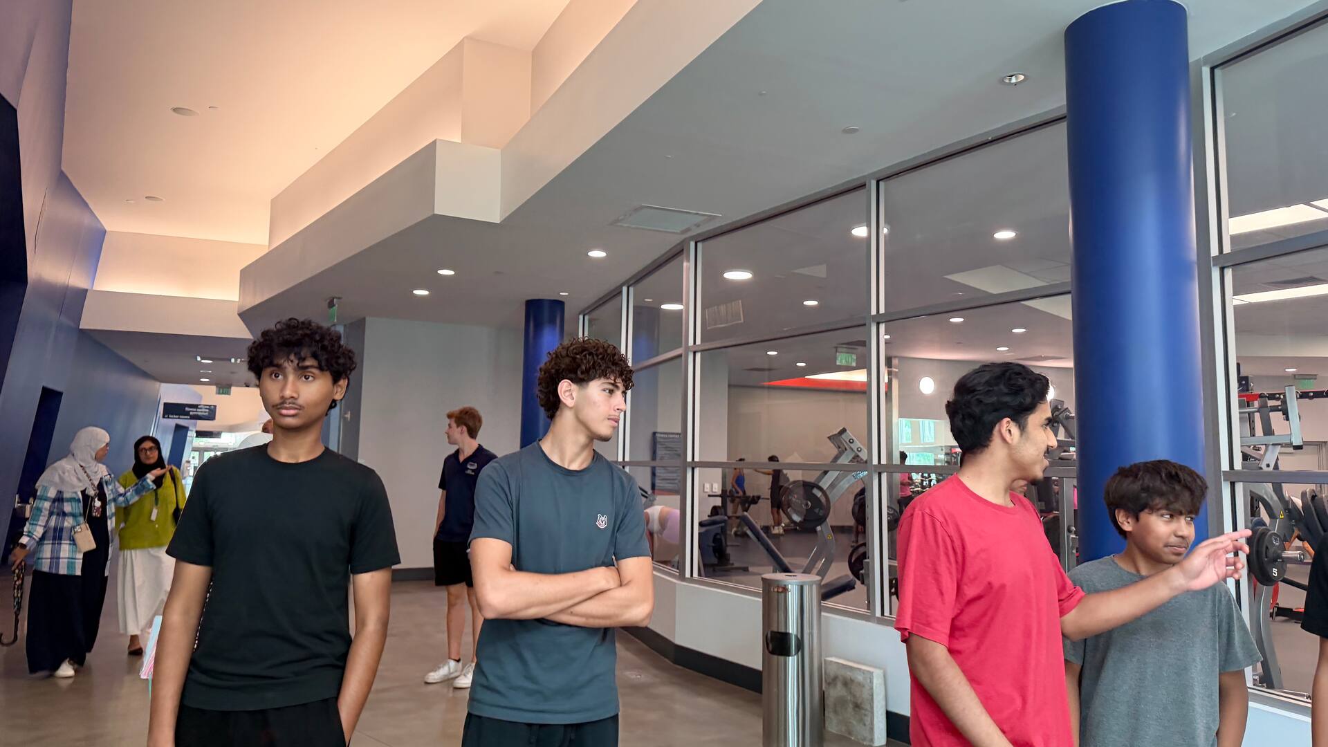 Students taking in the recreation center lobby
