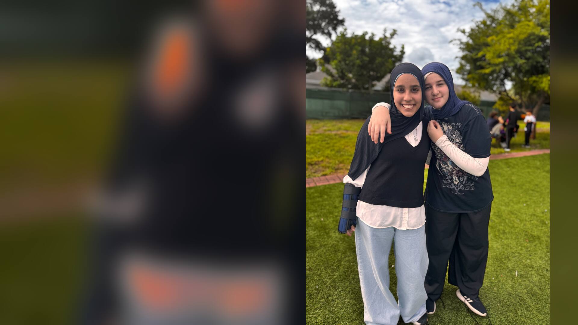 Two friends share a big hug and bright smiles on the field
