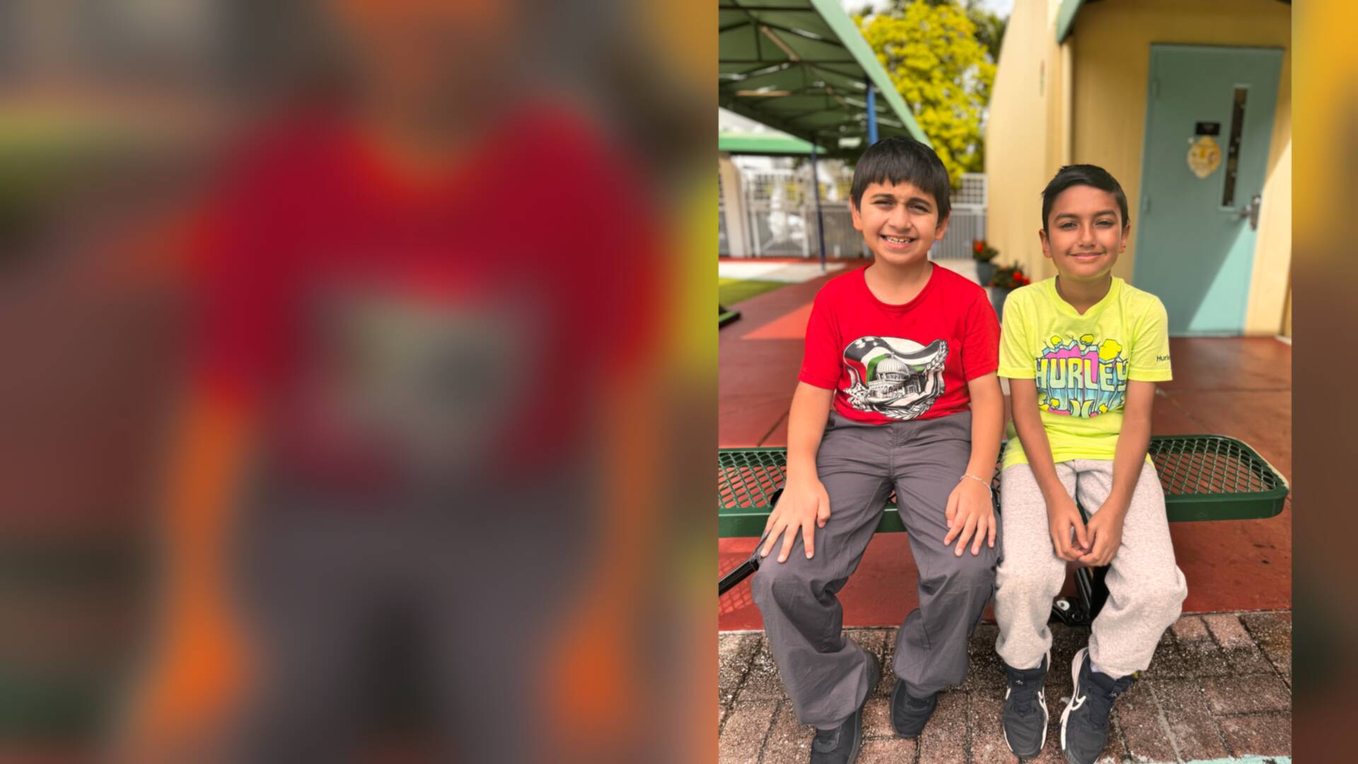 Two smiling friends in red and neon yellow tees sit side by side