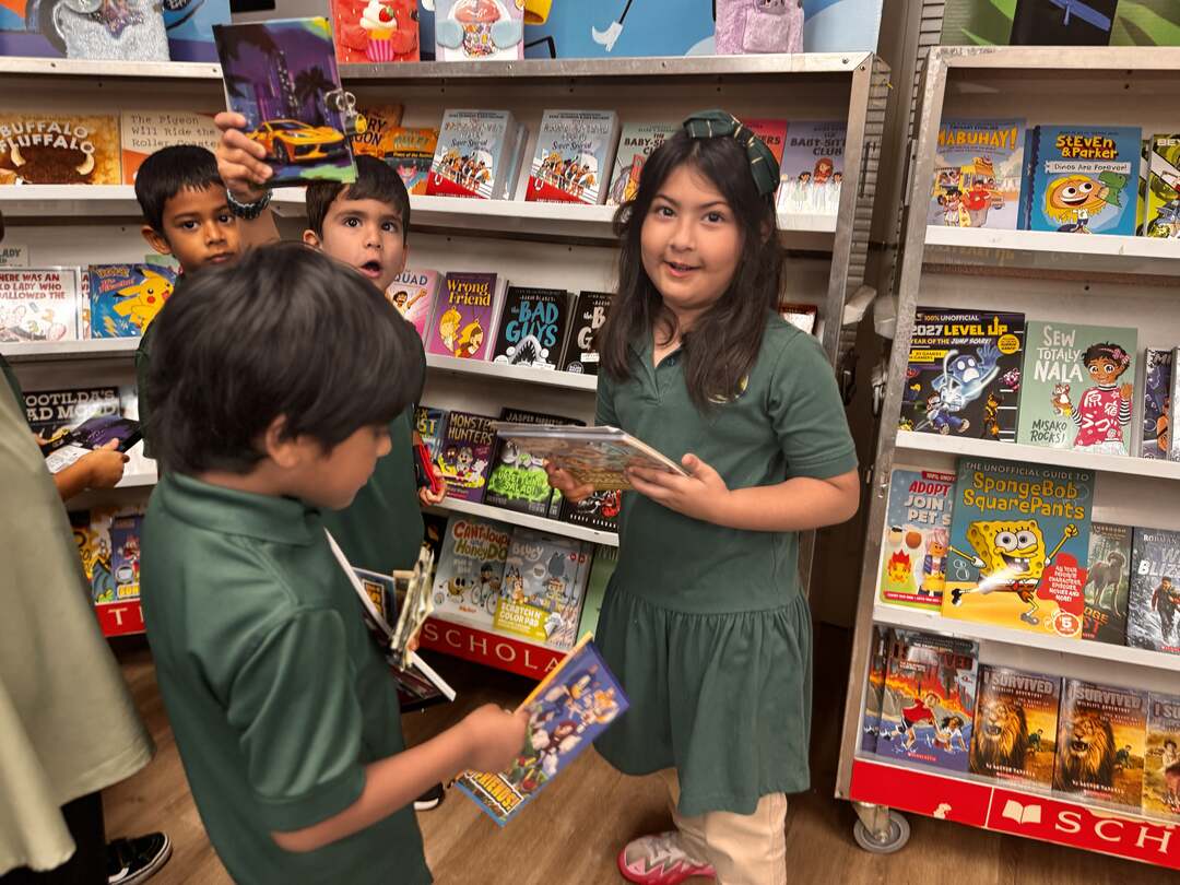 Young readers browsing the shelves for new books