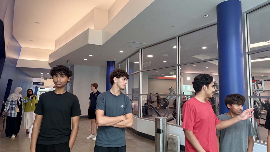 Students taking in the recreation center lobby