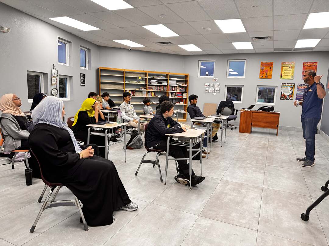 A wide view of the classroom during the guest speaker's visit